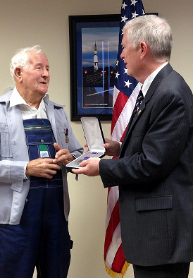 Congressman Brooks presents Mr. Selwyn Lamberth with Prisoner of War Medal.
