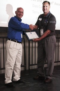ISR Group CEO Alfred Lumpkin (left) receives award for his support of the Tennessee National Guard August 27. 2013