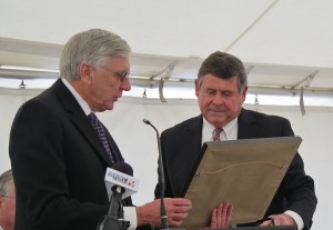  Mayor Ronnie Marks presenting Shape Corp. CEO Gary Verplank with a framed certificate honoring the company's celebration.