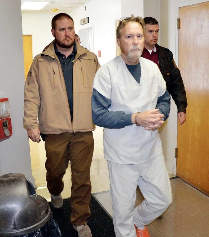 Handcuffed Cooper led into Marion County courtroom