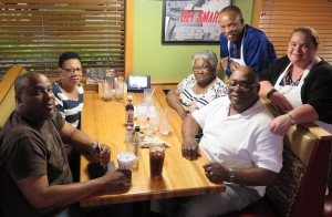 Jennifer Janzen and Celebrity Waiter Frank Travis with Jimmy Gill's family