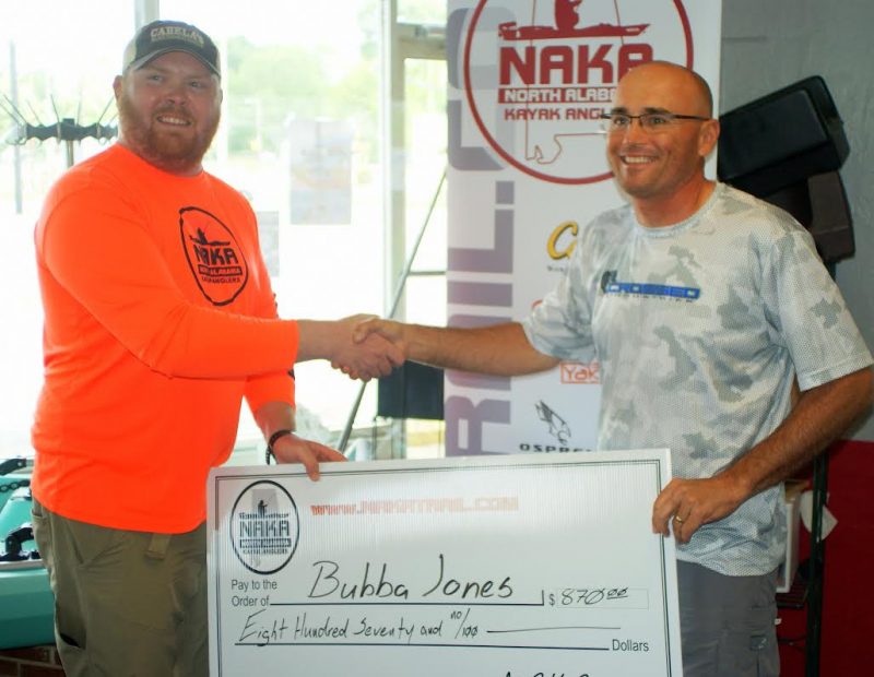 Tournament Director Chris McNeil congratulates  Bubba