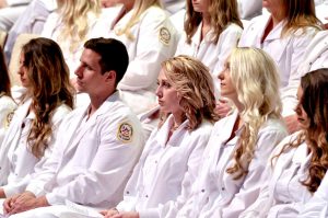 Nursing Graduates Listen to keynote address