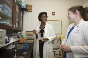 Dr. Lisa Ann Blankinship collaborates with UNA grad student Allison Shelton on microbiology project. Photo: Shannon Wells
