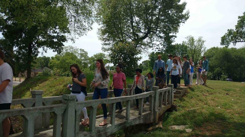 crossing the 1930s era bridge Trinity students once used